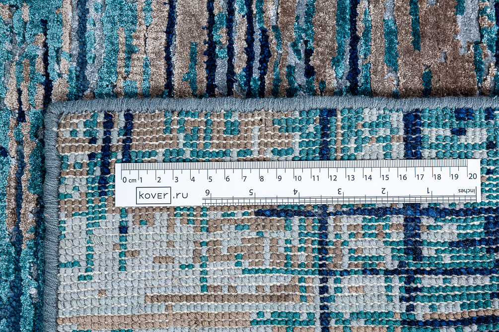 Индийский ковёр из шерсти и бамбукового шёлка «UVENUTI» LRB1532-OWBLU-DBLU